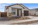 Charming single-story home with a two-car garage and desert landscaping at 16625 N Lunar St, Maricopa, AZ 85138