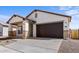 Attractive single-Gathering home with a spacious driveway and neutral color palette at 16625 N Lunar St, Maricopa, AZ 85138
