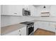 Clean kitchen with white subway tile backsplash and stainless steel appliances at 16625 N Lunar St, Maricopa, AZ 85138