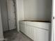 Unfinished bathroom with white cabinets at 22857 E Roundup Way, Queen Creek, AZ 85142