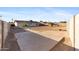 A large backyard shows ample room for entertaining, play, and features block wall fencing at 323 N 69Th Ave, Phoenix, AZ 85043