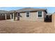 Large backyard featuring a covered patio and spacious, landscaped yard at 5335 W Manzanita Dr, Glendale, AZ 85302