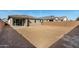 Large backyard with a covered patio, perfect for outdoor entertaining at 5335 W Manzanita Dr, Glendale, AZ 85302