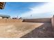 Spacious backyard surrounded by a brick fence at 5335 W Manzanita Dr, Glendale, AZ 85302