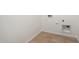 Laundry room with tile floors and washer/dryer hookups at 5335 W Manzanita Dr, Glendale, AZ 85302