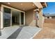 Covered patio area with sliding glass doors providing seamless indoor-outdoor living at 5335 W Manzanita Dr, Glendale, AZ 85302