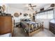 Comfortable main bedroom boasts natural light and decor at 26415 S Recker Rd, Queen Creek, AZ 85142
