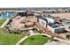 Aerial view of community amenities under construction, including a park and clubhouse at 1205 W Golden Ore Pass, Apache Junction, AZ 85120