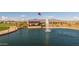 Waterfront view of a community lake with a gazebo and fountain at 1205 W Golden Ore Pass, Apache Junction, AZ 85120