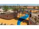 Modern playground with climbing wall and play structures at 1205 W Golden Ore Pass, Apache Junction, AZ 85120