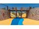 Playground with climbing wall, bridge, and slides at 1205 W Golden Ore Pass, Apache Junction, AZ 85120