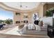 Relaxing main bedroom with fireplace and mountain views at 12943 E Corrine Dr, Scottsdale, AZ 85259