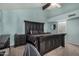 Comfortable main bedroom with a high ceiling, and an ensuite bathroom at 11035 E Clinton St, Scottsdale, AZ 85259