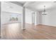 Open-concept living room with neutral walls and tile floors at 21611 S 191St Pl, Queen Creek, AZ 85142