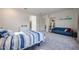 Serene bedroom with a view of the backyard and en-suite bathroom access at 14133 S 179Th Ave, Goodyear, AZ 85338