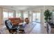 Bright and airy living room with comfortable seating and access to the backyard at 14133 S 179Th Ave, Goodyear, AZ 85338