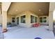 Spacious covered patio with seating for relaxing at 14133 S 179Th Ave, Goodyear, AZ 85338
