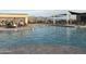Community pool with plenty of space for swimming and relaxing at 14133 S 179Th Ave, Goodyear, AZ 85338