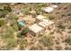 Aerial view of home featuring a backyard pool with lush foliage at 7002 N Hillside Dr, Paradise Valley, AZ 85253