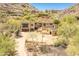 Breathtaking aerial view of this desert property showing the beautiful home and surrounding landscape at 7002 N Hillside Dr, Paradise Valley, AZ 85253