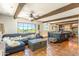 Inviting living space featuring exposed wood beams, tile floors, and an open layout with stunning views at 7002 N Hillside Dr, Paradise Valley, AZ 85253