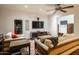 Inviting living room with comfortable seating, a TV, and a cozy atmosphere for relaxation and entertainment at 7002 N Hillside Dr, Paradise Valley, AZ 85253