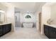 Luxurious bathroom with soaking tub, separate shower, and double vanity at 7628 E Mary Sharon Dr, Scottsdale, AZ 85266