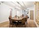 Formal dining room with a large wooden table and six chairs at 7628 E Mary Sharon Dr, Scottsdale, AZ 85266