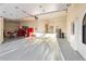 Bright and clean garage interior with built-in storage and a staircase at 7628 E Mary Sharon Dr, Scottsdale, AZ 85266