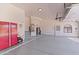 Garage with ample space, storage, and HVAC equipment at 7628 E Mary Sharon Dr, Scottsdale, AZ 85266