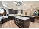 Gourmet kitchen boasting expansive island and stainless steel appliances at 7628 E Mary Sharon Dr, Scottsdale, AZ 85266