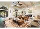 Open living area with exposed beams and comfortable seating at 7628 E Mary Sharon Dr, Scottsdale, AZ 85266