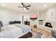 Main bedroom with fireplace, TV and plenty of natural light at 7628 E Mary Sharon Dr, Scottsdale, AZ 85266