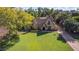 House with a large green lawn and driveway at 363 E Monte Vista Rd, Phoenix, AZ 85004