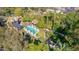 Aerial view highlighting a house, pool, and surrounding landscape at 363 E Monte Vista Rd, Phoenix, AZ 85004