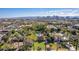 Aerial view of a house with pool, showcasing the property and city skyline at 363 E Monte Vista Rd, Phoenix, AZ 85004