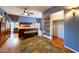 Spacious bedroom with hardwood floors, large bed, and ample closet space at 363 E Monte Vista Rd, Phoenix, AZ 85004