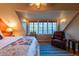 Spacious bedroom with large windows and sitting area at 363 E Monte Vista Rd, Phoenix, AZ 85004