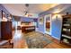 Main bedroom with king-size bed, wooden furniture, and access to bathroom at 363 E Monte Vista Rd, Phoenix, AZ 85004