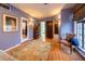 Bedroom with hardwood floors, sitting area, and access to bathroom at 363 E Monte Vista Rd, Phoenix, AZ 85004