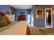 Main bedroom with king-size bed, wooden furniture, and access to bathroom at 363 E Monte Vista Rd, Phoenix, AZ 85004