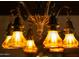 Ornate antique chandelier with warm lighting at 363 E Monte Vista Rd, Phoenix, AZ 85004