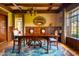 Elegant dining room with wood table and chandelier at 363 E Monte Vista Rd, Phoenix, AZ 85004