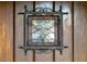 Close-up of the front door's intricate iron window detail at 363 E Monte Vista Rd, Phoenix, AZ 85004