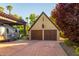 Two-car garage with covered parking and Airstream at 363 E Monte Vista Rd, Phoenix, AZ 85004