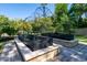 Landscaped garden with raised planting beds and metal framework at 363 E Monte Vista Rd, Phoenix, AZ 85004