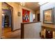 Upper hallway with hardwood floors, art, and skylight at 363 E Monte Vista Rd, Phoenix, AZ 85004