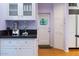 White kitchen with stainless steel appliances and butler's pantry at 363 E Monte Vista Rd, Phoenix, AZ 85004
