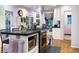Modern kitchen with island and stainless steel appliances at 363 E Monte Vista Rd, Phoenix, AZ 85004