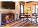 Living room with fireplace and ornate details at 363 E Monte Vista Rd, Phoenix, AZ 85004
